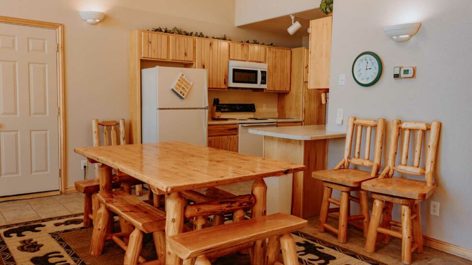 Kitchen and dining in a cabin rental in Bemidji, Minnesota.