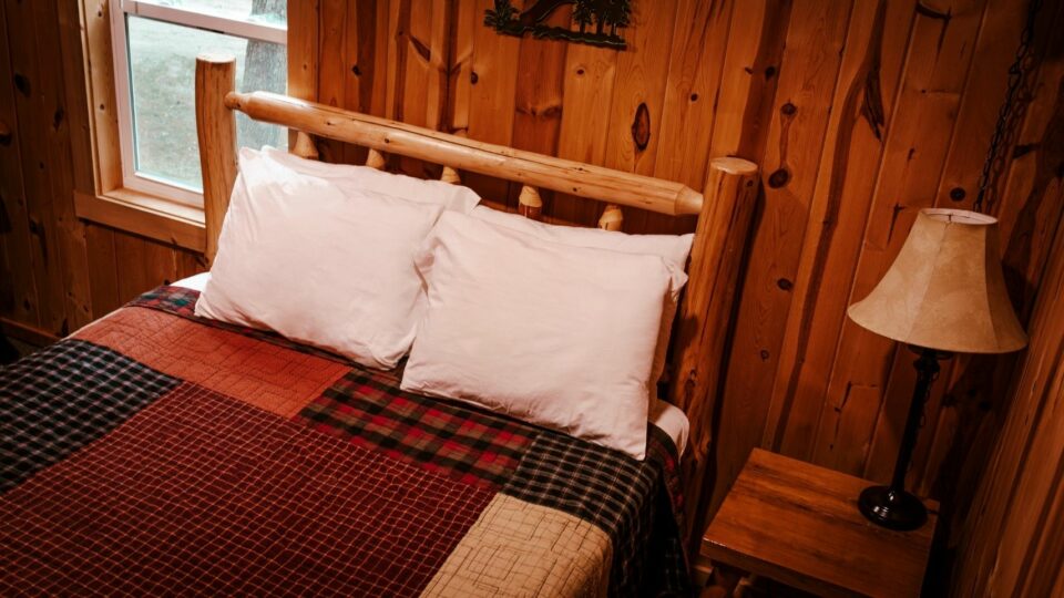 Queen bedroom in a cabin at Kohl's Resort.